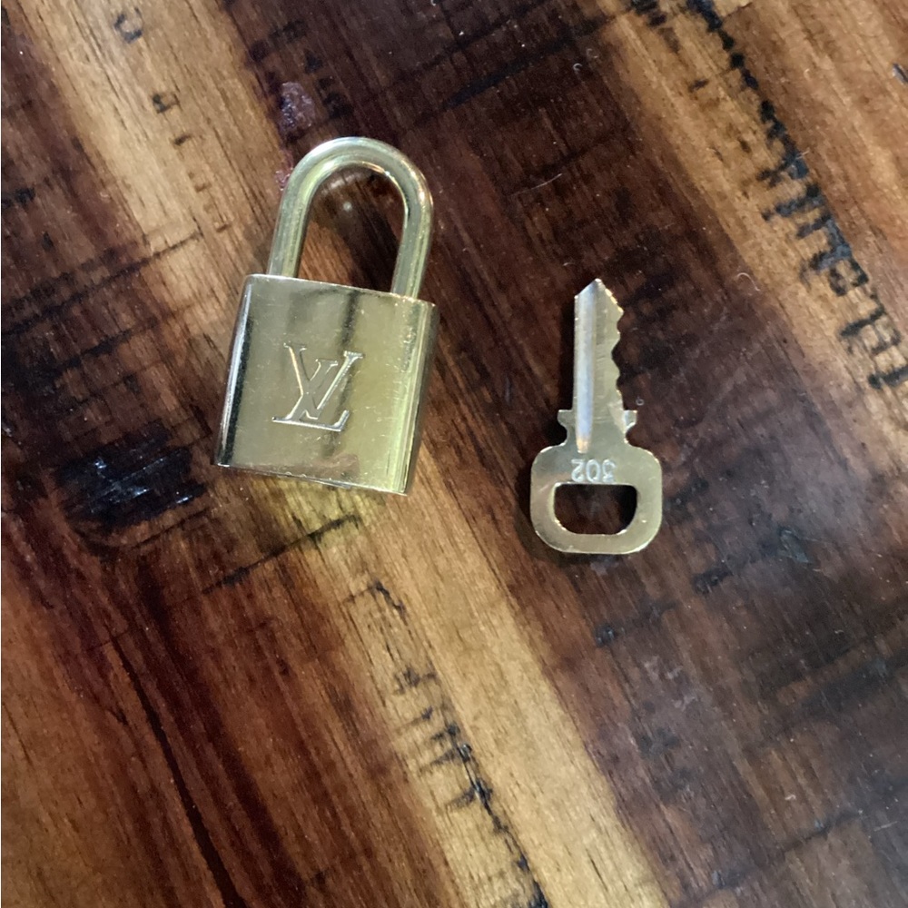 Louis Vuitton lock and key.
